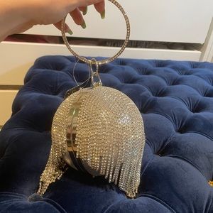 PLT Circular bag with silver bejewelled fringe.